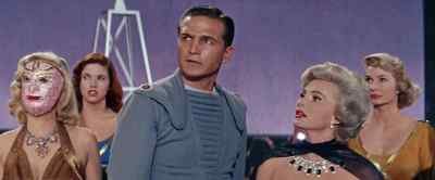 My electronic telescope
makes every detail clear. - Queen of Outer Space
