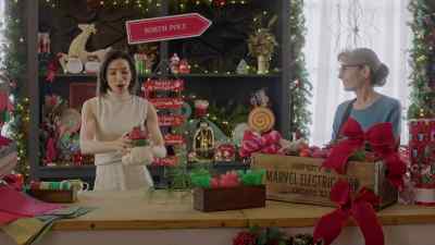 My shoebox apartment can
barely fit a tabletop tree. - Once Upon a Christmas Wish