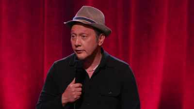 Na taj način, za
let kući, osećaće - Rob Schneider: Woke Up in America