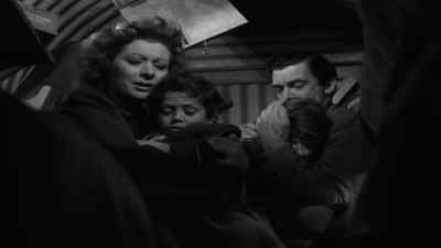 Napoleon's all right, darling.
He's gone under there. - Mrs  Miniver