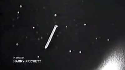Narrator: A CAMERA RECORDS THE
SATELLITE DRIFTING AWAY INTO SPACE, - Strange Evidence