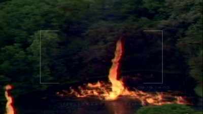 Narrator: A HELICOPTER SURVEILLANCE
CAMERA CAPTURES A TOWERING INFERNO. - Strange Evidence