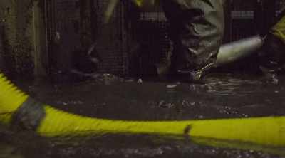 [narrator] After nine hours
of Herculean work, - Sewer Divers