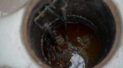 [narrator] Along
with the grease and fat, - Sewer Divers
