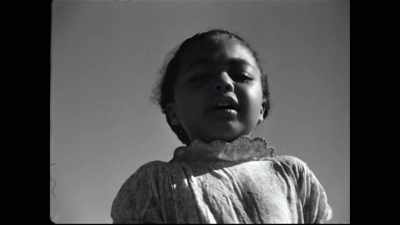 NARRATOR: And, look, Orson!
Low angle, a girl crying, - The Eyes of Orson Welles