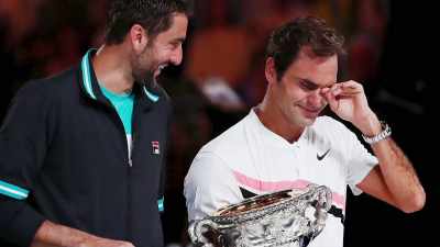 - [Narrator] At the
2018 Australian Open, - Roger Federer: A Champions Journey