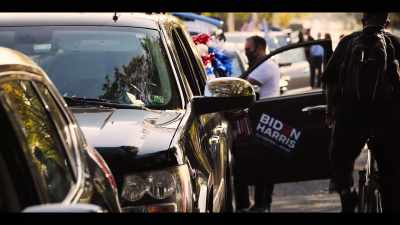 [narrator] Biden also hosts
COVID-safe drive-in rallies, - Death to 2020