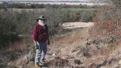 NARRATOR:
Born and raised in
central Texas, - Beyond Oak Island