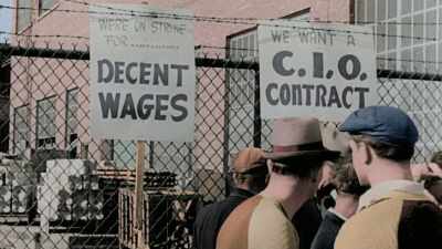 Narrator:
BUT AS AMERICAN FACTORIES - America in Color