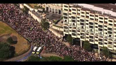 [narrator] By now, the protests
have gone international, - Death to 2020