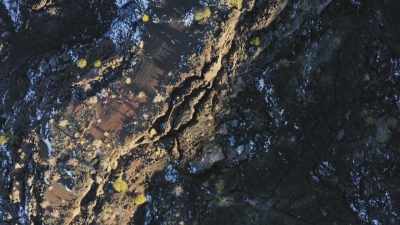 [narrator] Distinctive dark
features in the surrounding
terrain - Mysteries of the Abandoned