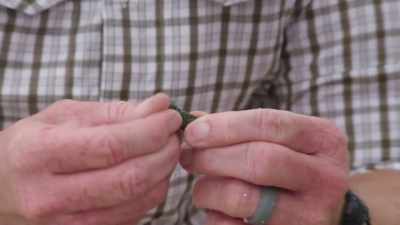 NARRATOR:
Finding an ancient deck spike, - Beyond Oak Island