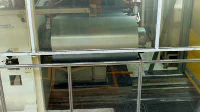 NARRATOR: First,
giant rollers unwind the sheet steel, - Europe From Above