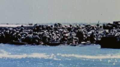 NARRATOR: Hatch carries
his hand-cranked 35mm camera - The Pacific War in Color