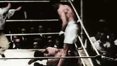 Narrator: IN 1926
HE FIGHTS GENE TUNNEY, - America in Color