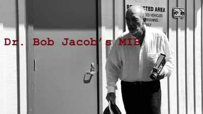 NARRATOR: In 1964, 
Dr. Robert Jacobs was in charge  - Who Saw the Men in Black