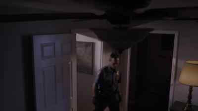 Narrator: In the
front living room, - Homicide Hunter: Lt Joe Kenda