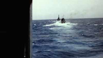 Narrator: JAPAN THINKS IT HAS
AMERICA'S NAVY ON ITS KNEES. - The Pacific War in Color