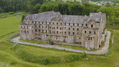 [narrator] Overlooking
the newly completed asylum - Mysteries of the Abandoned