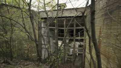 Narrator: Production buildings
held more equipment - Secret Nazi Ruins