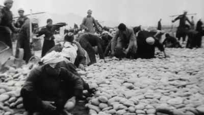 Narrator: ROCKS ARE ABOUT
THE ONLY RESOURCE AVAILABLE, - The Pacific War in Color