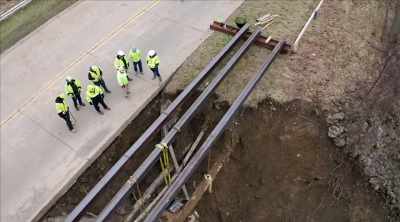 [narrator]  Sinkholes
occur when water - Sewer Divers
