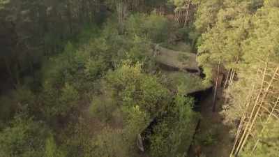 Narrator: The forest camouflage
would be effective - Secret Nazi Ruins