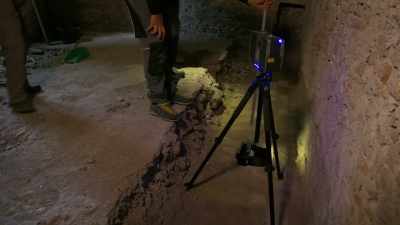 NARRATOR: The team lowers a camera down
into the hole to inspect the void. - Lost Treasures of Rome