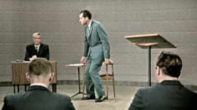 Narrator: THE VISUAL CONTRAST
BETWEEN THE MEN DAMAGES NIXON. - America in Color