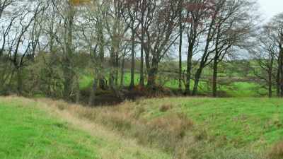 NARRATOR:
This ditch stretches into the distance - Lost Treasures of Rome