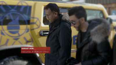 [narrator]
This is Sanjay Jain, - The New Corporation: The Unfortunately Necessary Sequel