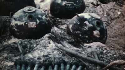 Narrator:
TINIAN IS RIDDLED WITH THEM. - The Pacific War in Color