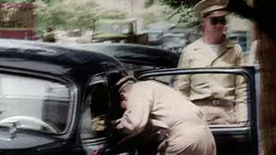 Narrator:
TRUMAN FIRES MacARTHUR. - America in Color