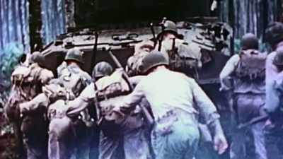 NARRATOR:
Twenty-year-old Eugene Sledge - The Pacific War in Color