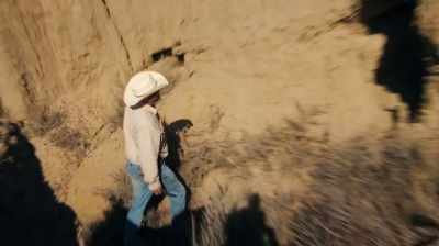 Narrator: WHILE MIKE AND JAKE
ARE TIED UP WITH COWBOY REX, - Dino Hunters