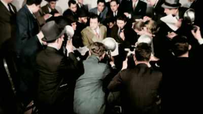 Narrator: WHILE ORSON WELLES
TERRIFIES LISTENERS - America in Color
