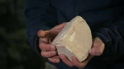 Narrator:
Within the destruction layer, - Dead Sea Scrolls: The Doomsday Prophecy