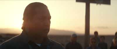 Nataanii's father Ronald
has gathered us here today. - Rez Ball