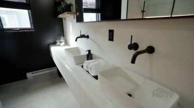 Natalie/Bryan: Yeah.
Scott: A nice big walk-in shower - Renovation Resort