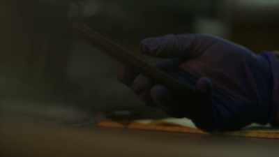 [Newman] Examining
Heather’s phone, - A Time to Kill