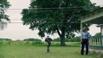 ( newscaster speaking
over TV) - Queen Sugar