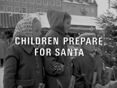 NEWSCASTER: Today, children
everywhere are making preparations - Santa Claus Is Comin' to Town