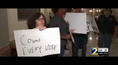 NEWSMAN: And some Abrams
supporters protested peacefully - All In: The Fight for Democracy