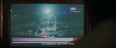 (newsman speaking Arabic on TV) - Last Light
