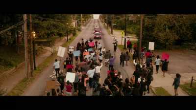 NEWSREADER (on TV):
A protest took place - The Hate U Give
