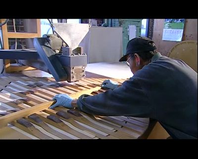 NEXT, HE THINS THE RIBS
AROUND THE EDGES - How It's Made