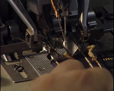 NEXT STEP -- THE BUTTONHOLE. - How It's Made