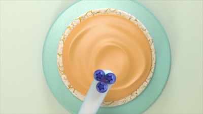 Next, use your blueberries
to make cute kitty-cat eyes and a nose. - Gabby's Dollhouse