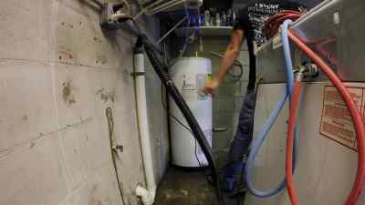 Next, we're getting rid
of that old water heater - Zombie House Flipping