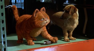 Nice kitty Let's see what's on the news - Garfield
